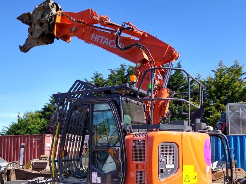 Hitachi 13 ton Demolition Spec Excavator with a 2 Ton Demerac MQP attachment on a 2 piece Articulated Boom & Witches Hat.